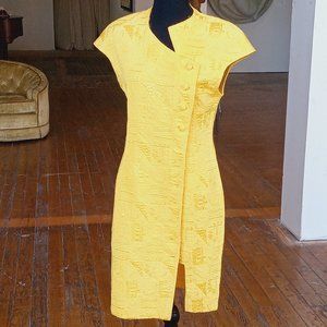 Yellow Avant guard buttoned down dress. Still missing a button.